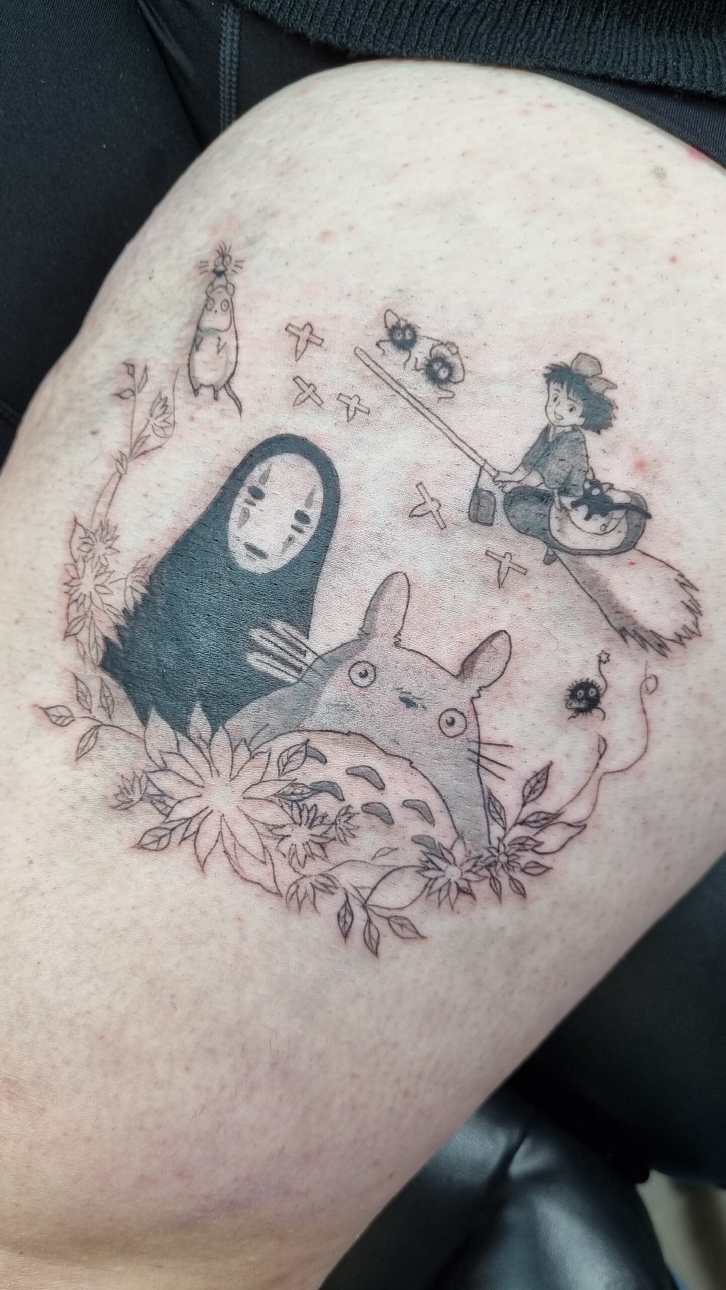 black and grey studio ghibi tattoo on thigh by nat what i tat at 7th house tattoo fredericton new brunswick canada