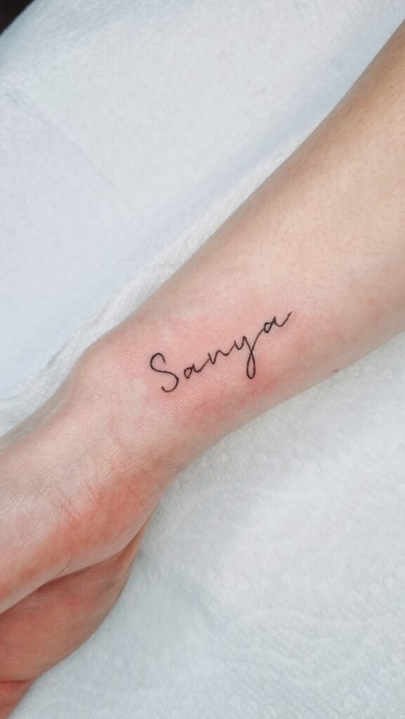 fine line script writing tattoo on wrist by nat what i tat at 7th house tattoo fredericton new brunswick canada