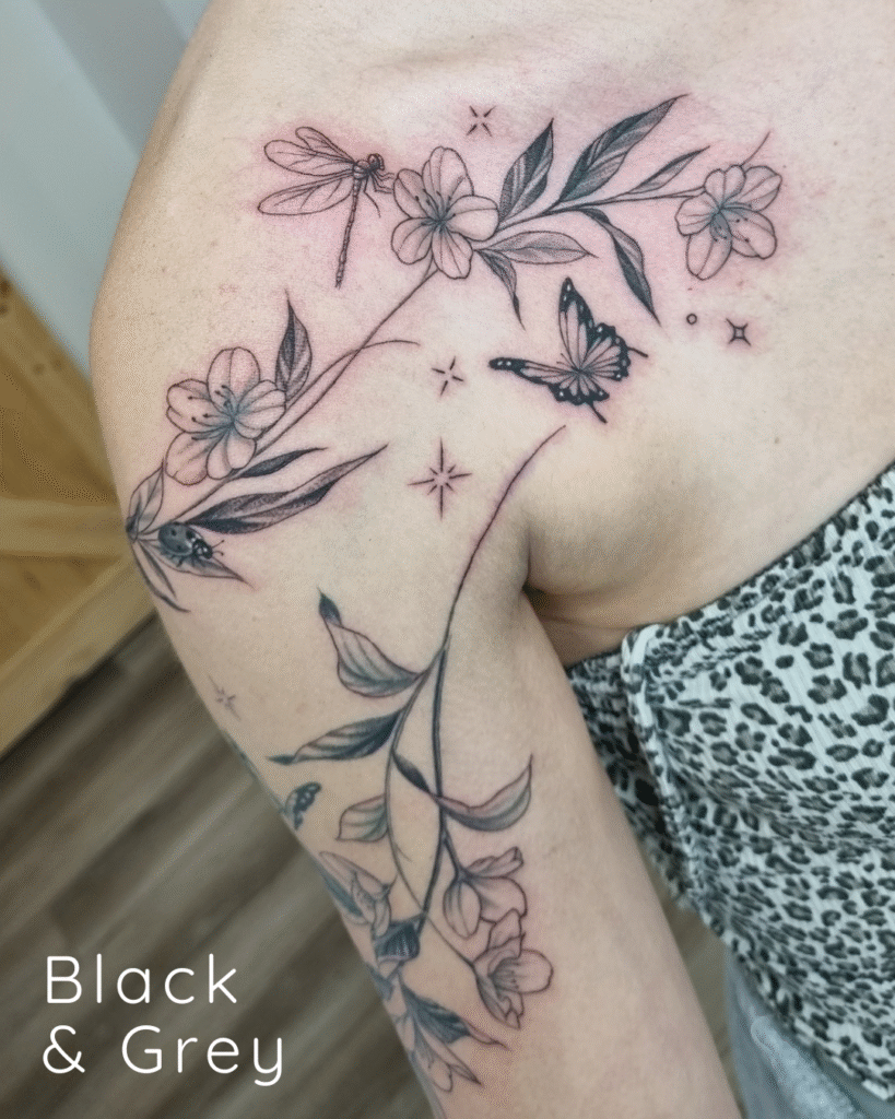 2 Black and grey floral shoulder piece featuring a dragonfly and butterfly.